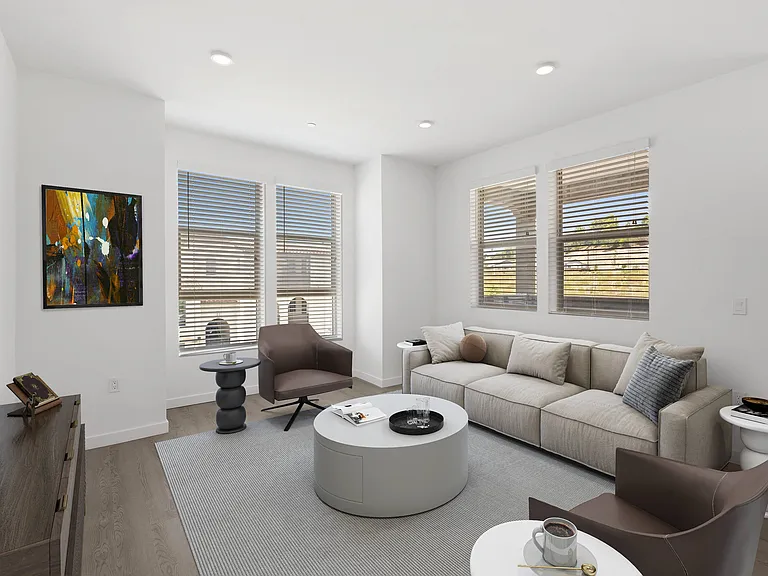 Enjoy a bright and airy atmosphere in your spacious living room.