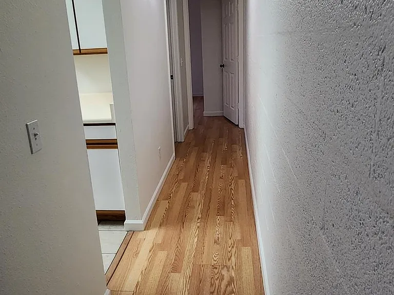 Hall to downstairs bedroom