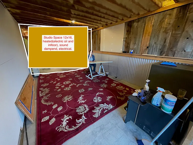 Studio from entry door. There is a back wall/door to space where text block is. Also space is heated with electric and in-floor heating, might have additional cost defendant on electrical/heat use.