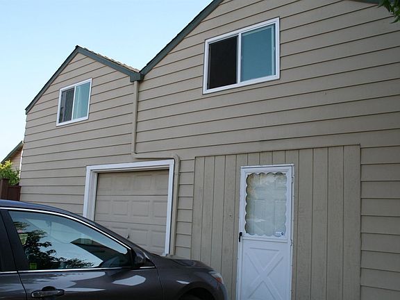 APRT. BEDROOM OVER GARAGE AND APRT. BATH OVER DOORWAY.