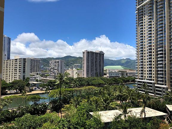 View from Patio . Manoa Valley breezes and in picture Convention Center and Ala Wai Canal.