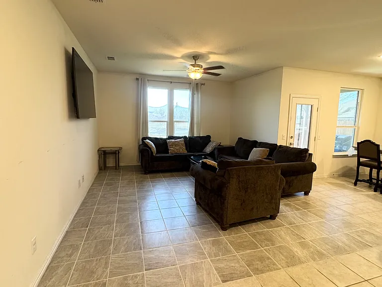 Open concept living dining & kitchen area.
