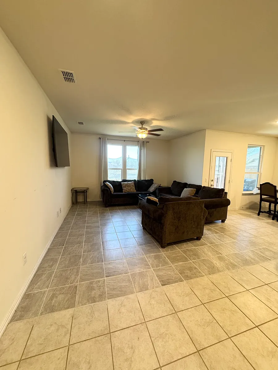 Open concept living dining & kitchen area. - 231 Hadley Ln