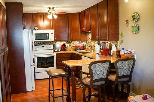 1st image of 6980 E Girard Ave APT 103