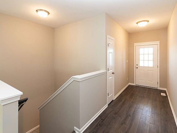 Stairwell leading to basement, from foyer.