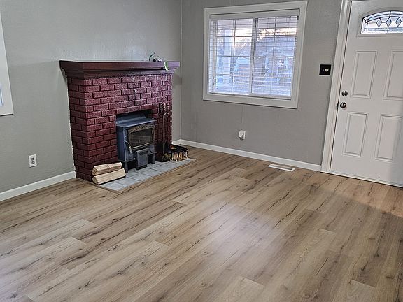 Living room with working fireplace.