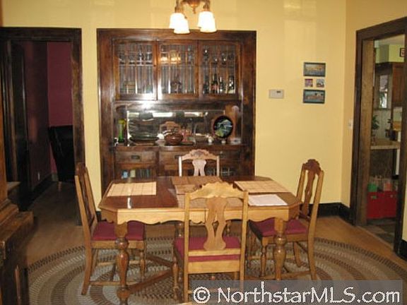 Stunning cherry woodwork and built-in buffet makes this home classic!