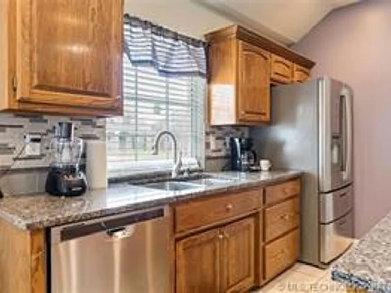13609 E 90th Ct N — Photo 11