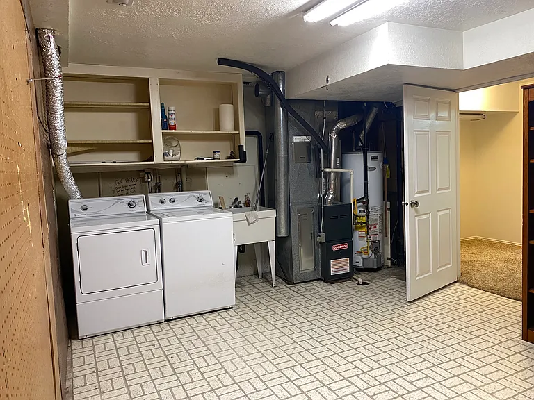 Laundry room with lots of storage.