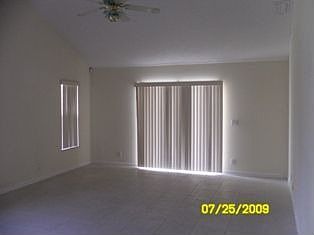 Master with glass doors to pool