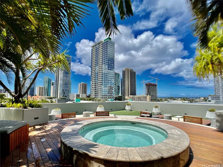 1 of 2 hot tub on sunny cool breezy area
