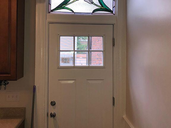 kitchen door with hand made stained glass transom