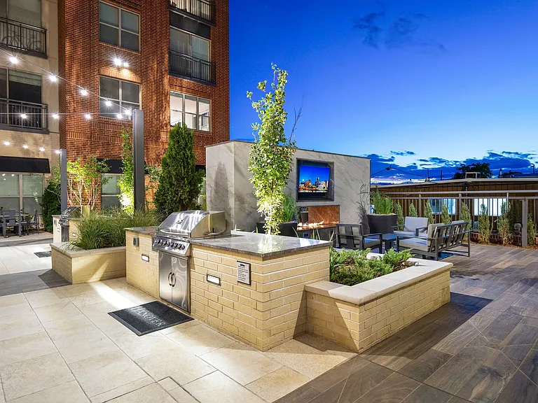 Outdoor lounge complete with grilling stations and cozy seating