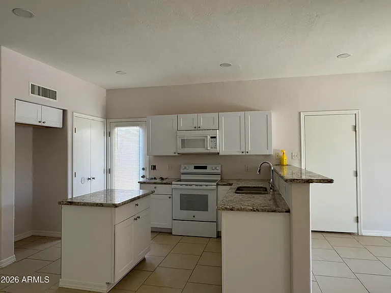 1309 S 121st Ln — Photo 2