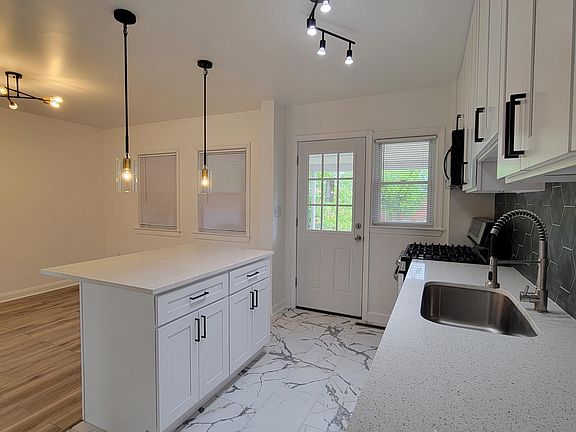 Completely Renovated Kitchen with Quartz Counter Tops