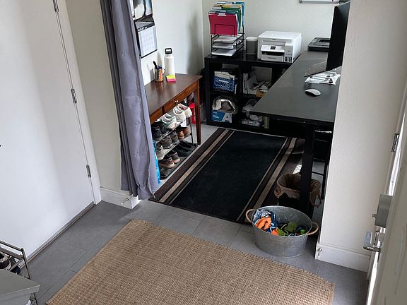Office/flex space - ground level (entrance to 2 car garage through white door on left in photo)