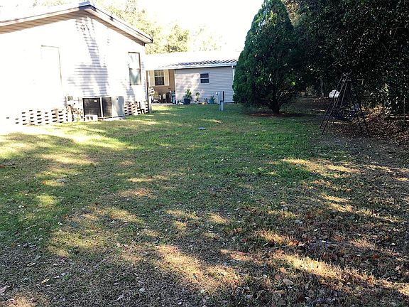 Back of Home w/ Large Back Yard