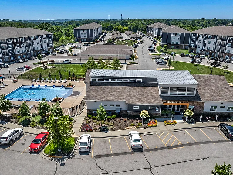 Community amenities include a resident clubhouse, resort-style pool, outdoor kitchen, hammock courtyard, and dog park.