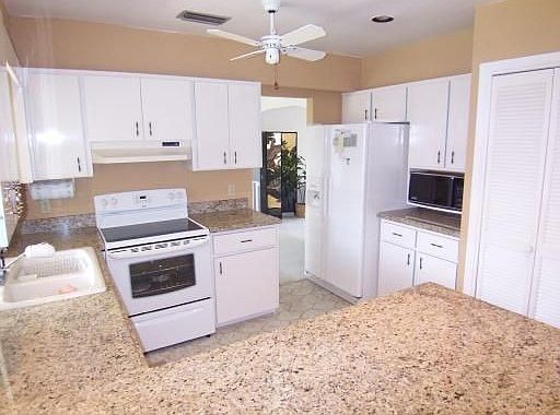 Kitchen with granite countertops