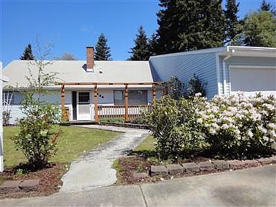 Expanded 2-story home with attached heated four car garage located on quiet cul-de-sac and close to 