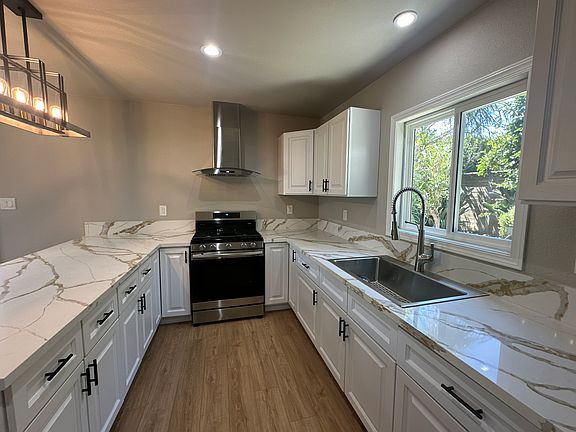 Stainless steel appliances, lots of cabinet space and durable counter tops.