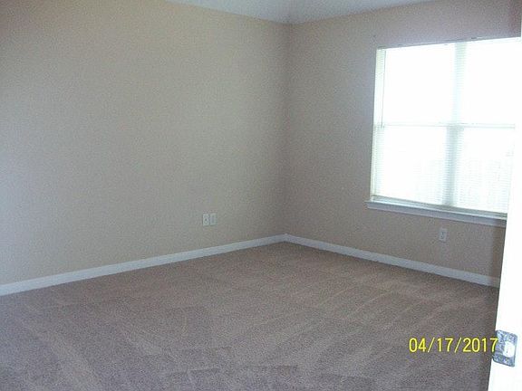 Master suite 13' x 15' with neutral carpet