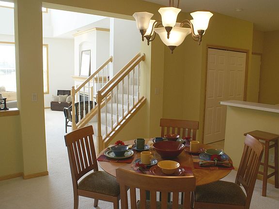Huge Dining Area, Gorgeous Chandelier! Tastefully Decorated-A Must See!