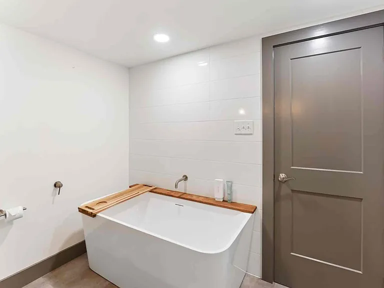 Downstairs bathroom with huge soaking tub