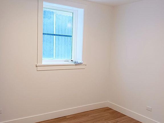 Larger bedroom with private bathroom