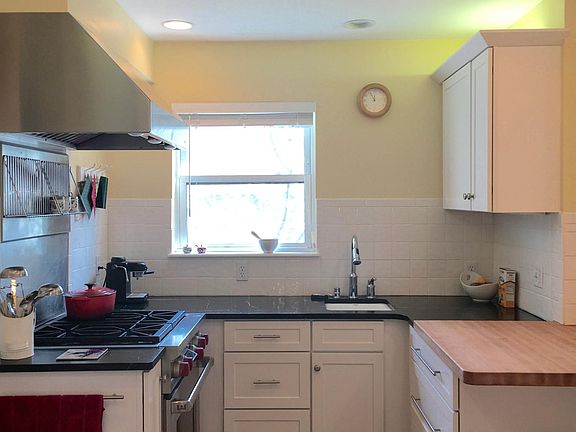lots of counter space; Wolf stove; window view of backyard