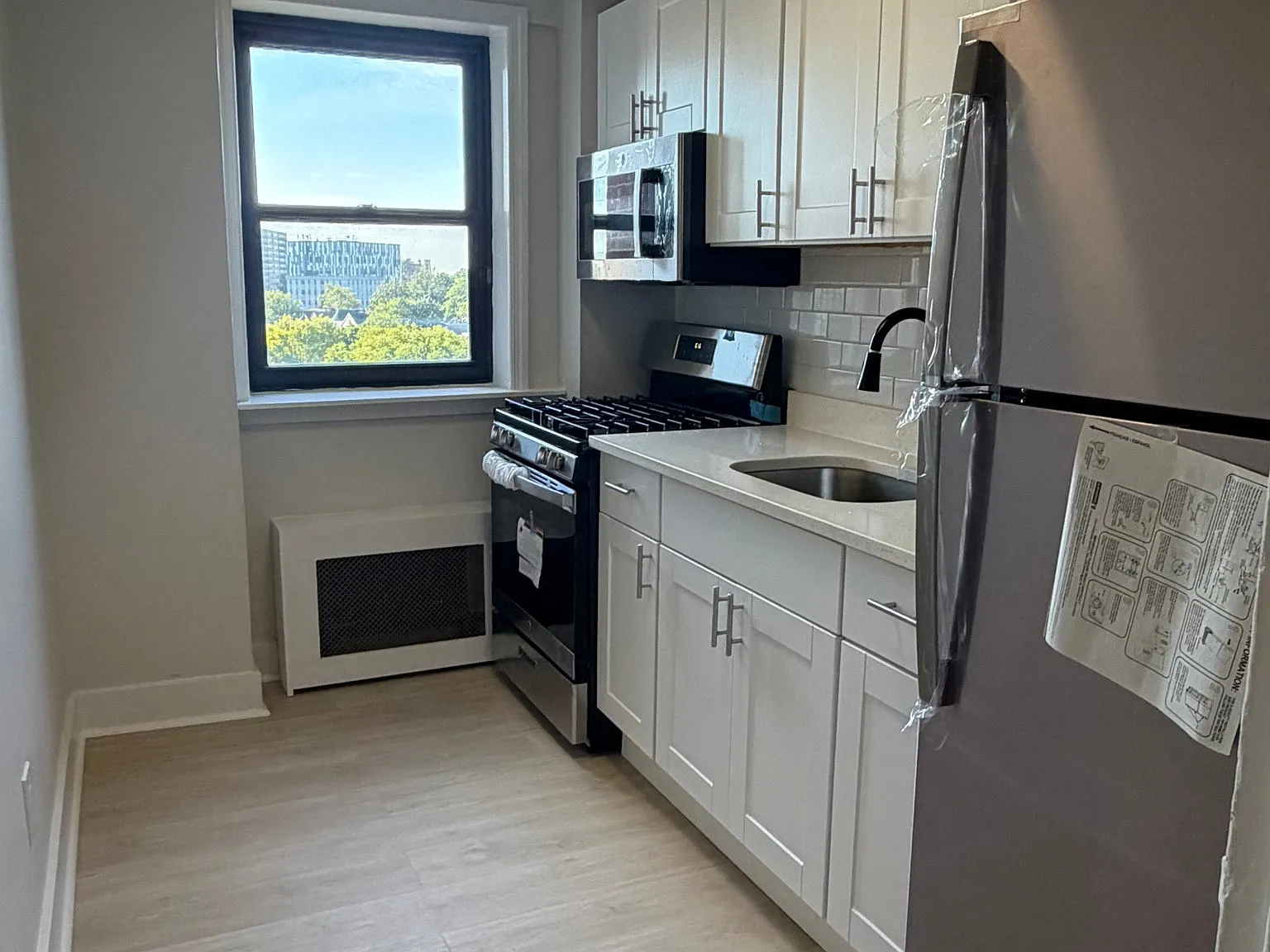Beautifully Renovated 2-Bedroom - All Utilities Included! — Photo 2
