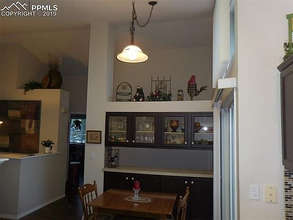 Notice the nice built-in hutch for your china in the dining area