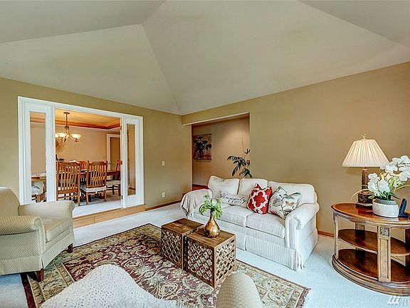 Alternate View Of The Living Room Shows The Adjoining Dining Room.  Carpets Throughout The Home Have Just Been Professionally Cleaned.