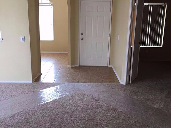 ENTRY - ARCH LEADS TO KITCHEN