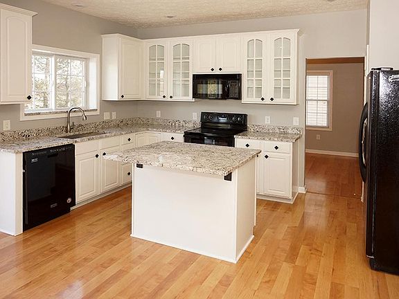Kitchen with new granite countertop