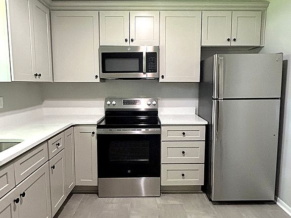 Kitchen: Completely Renovated
New Appliances, Cabinets, Countertops, and Flooring