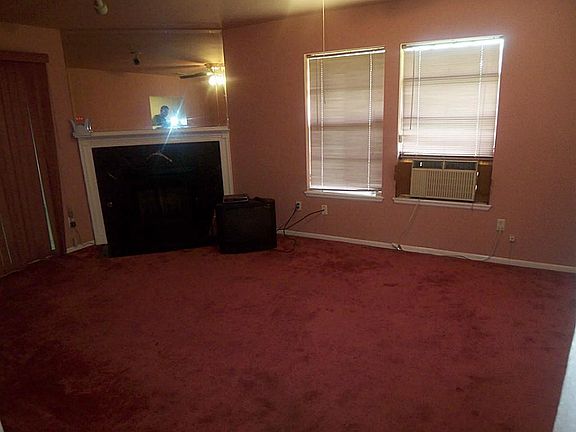 LARGE OPEN DEN WITH GAS FIREPLACE