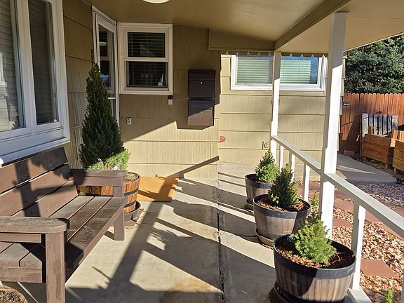 Front Porch of House with Private Mailbox for Unit