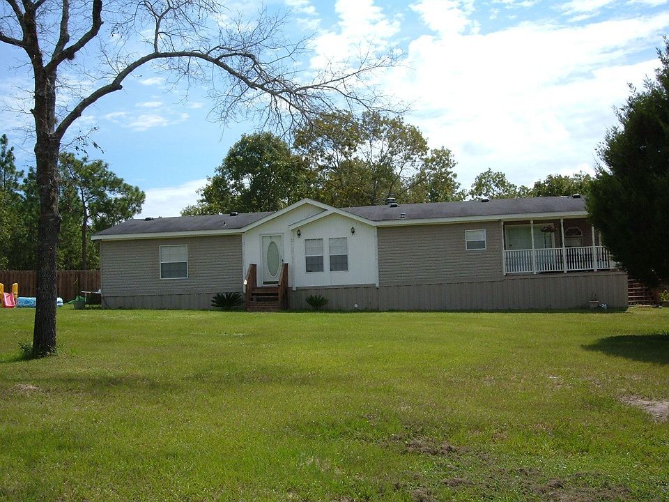 2.5 Acres Surrounds this 3 bedroom Home