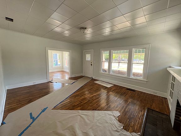 Living room looking southwest toward street and front door
