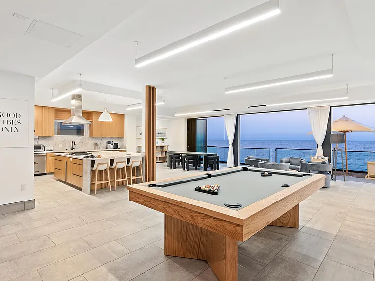 A game of pool with expansive ocean views is the perfect combo.