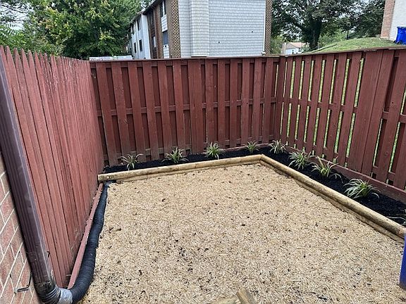 Enclosed Front yard - freshly seeded grass and landscaping