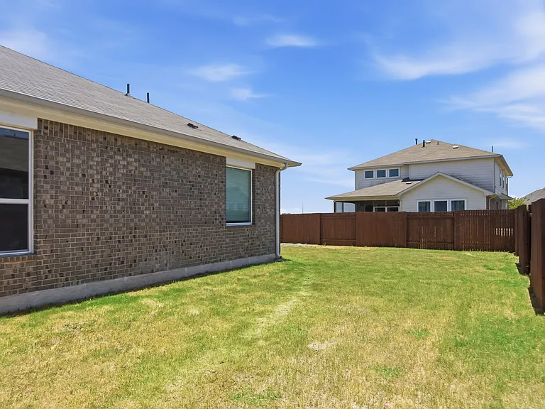 115 Rough Bark St — Photo 25