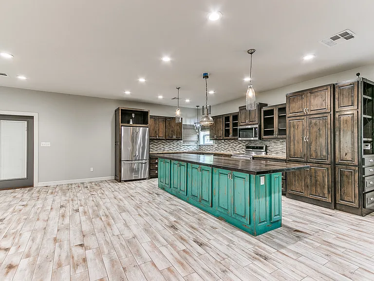 Custom kitchen with all the storage one could dream of!