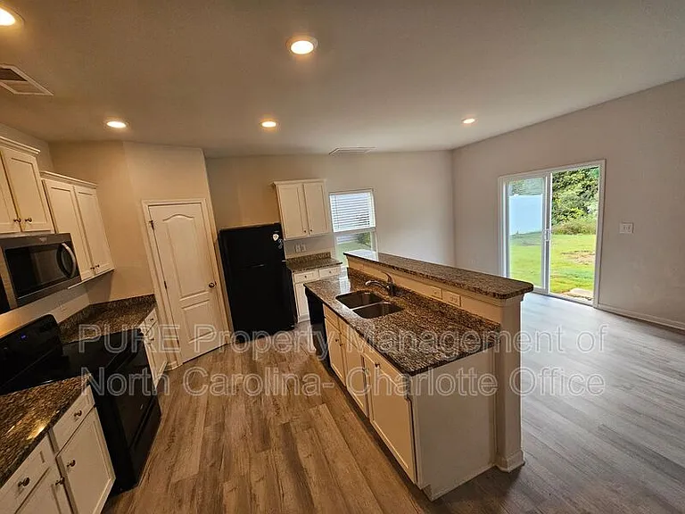 7015 Amberly Hills Rd — Photo 6