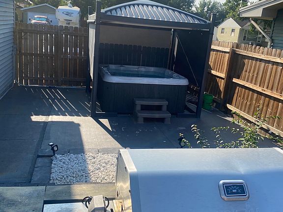 Hot tub when canopy is raised.