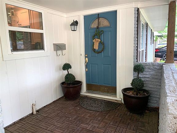 Inviting front porch entry. Lots of updated inside & out including All Double-paned windows throughout! Never flooded! Sewer plumbing replaced. Foundation repaired with Lifetime Transferable Warranty.