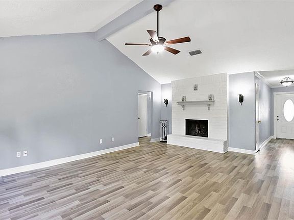 Spacious Living Room with Cathedral Ceiling.