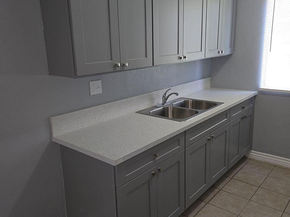 Remodeled Kitchen cabinets with granite countertop