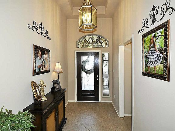 Extraordinary foyer with etched glass front door & bright transoms. All tile & wood on main traffic 